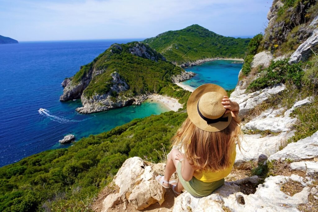 A solo female traveler at a viewpoint in Corfu, Greece