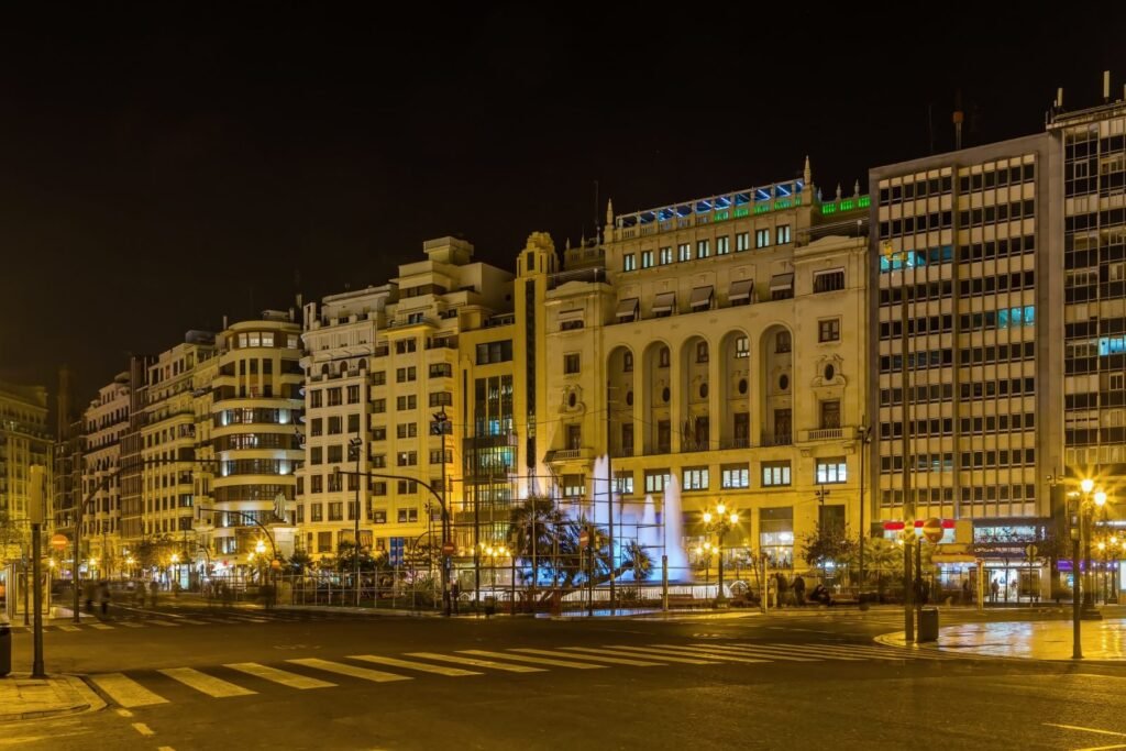 Plaza del Ayuntamiento with fountain in the evening, Valencia