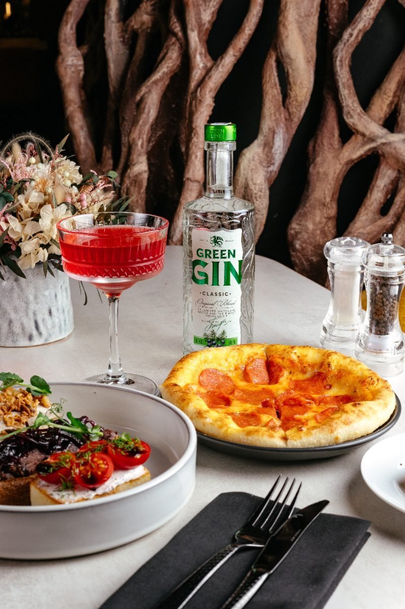 Italian aperitivo with cocktail and snacks