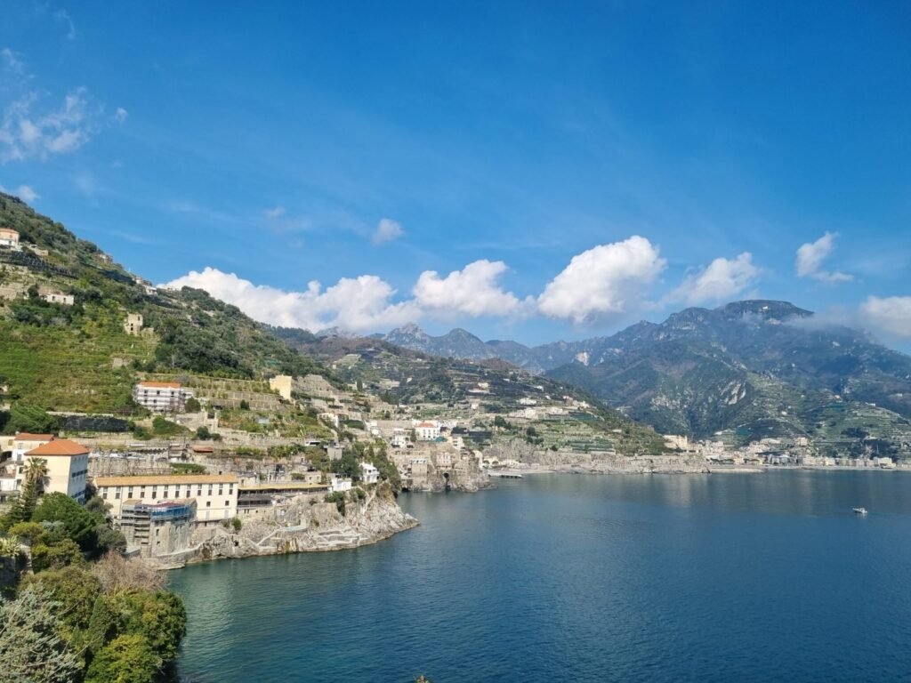 View of Amalfi on the coast with lemons in the foreground