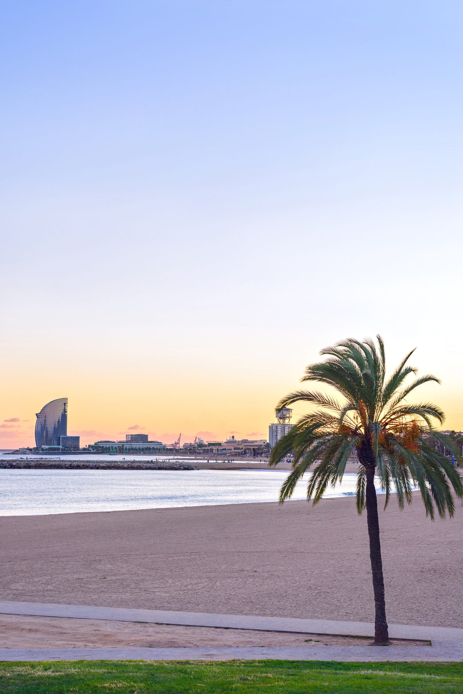 Barcelona beach at sunset, Platja Nova Icaria near Barceloneta