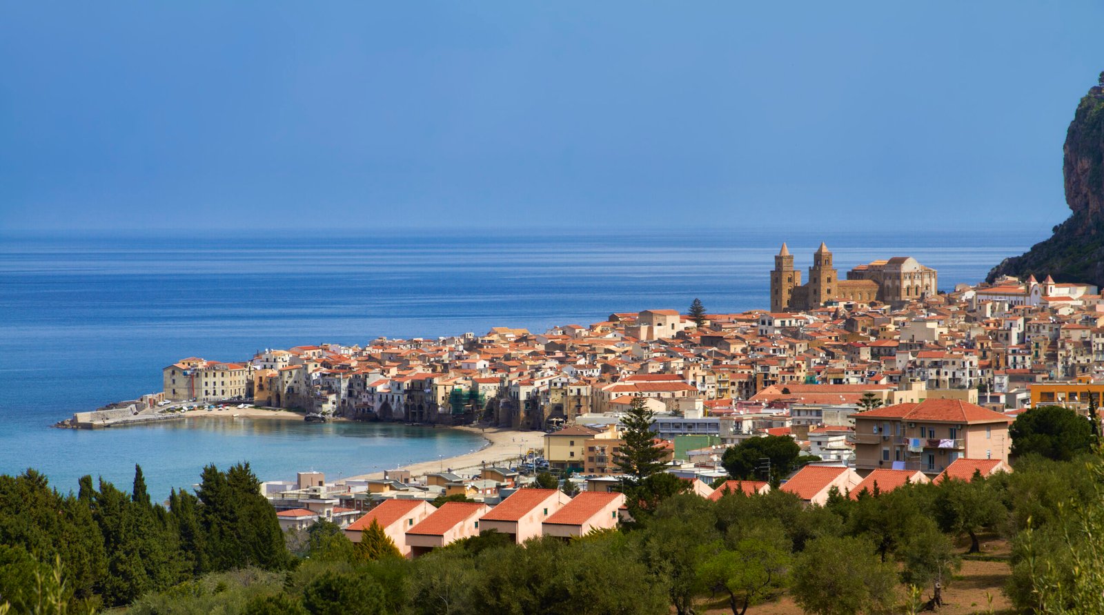 Panoramic view of Cefalu coastal town and cathedral in Sicily