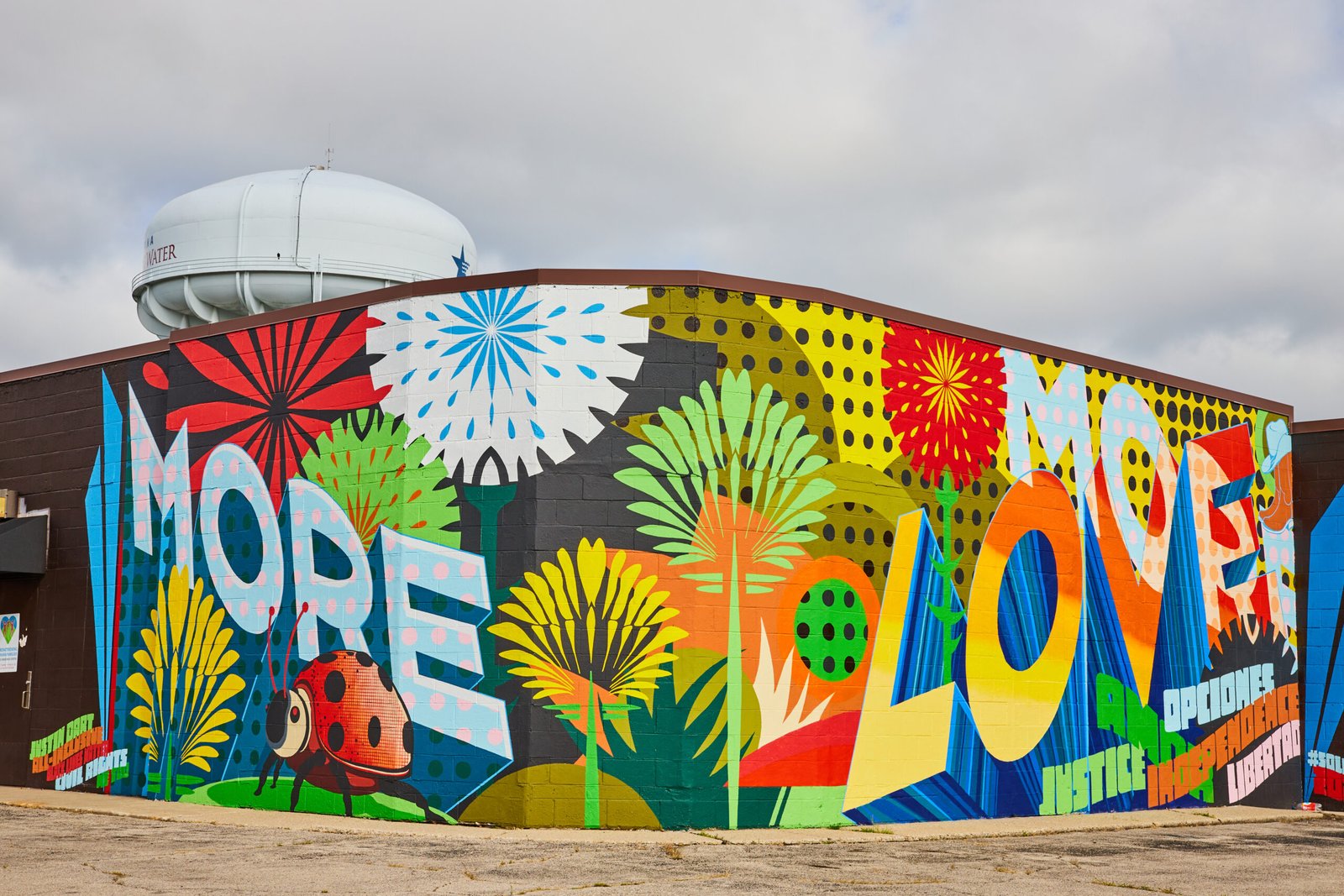 A vibrant colorful street art mural, similar to those found in Wynwood, Miami