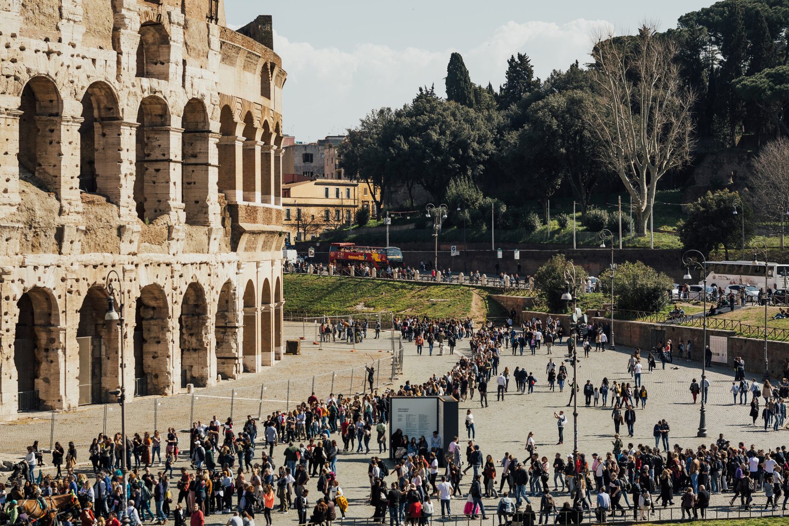 Tourists visiting the Colosseum in Rome, Italy