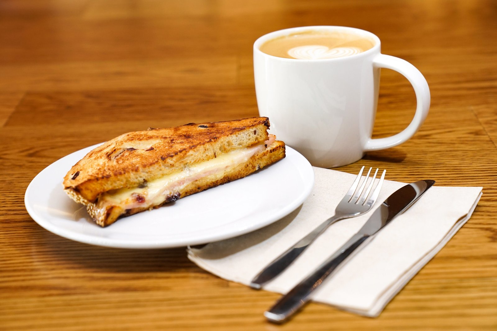 Local cafe sandwich and coffee on wood table