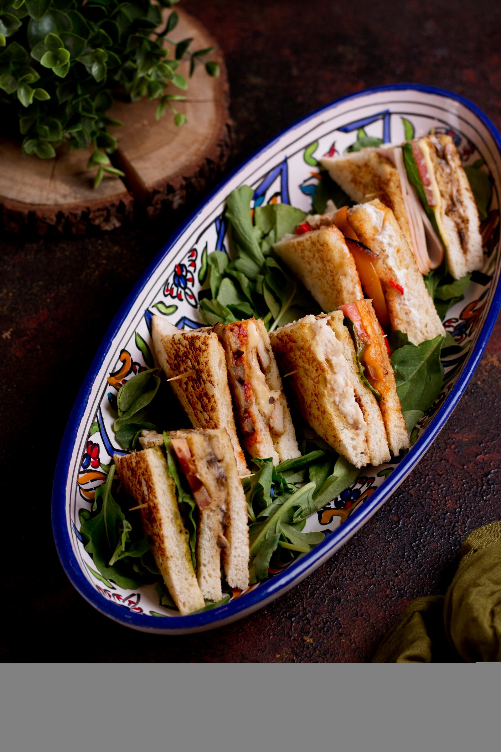 Assorted sandwiches served on a tray, budget-friendly Miami eats