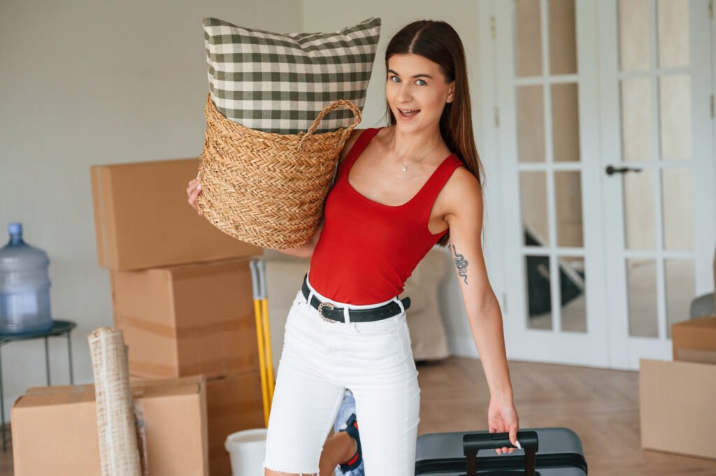 A woman preparing to move into a new home while relocating to Spain