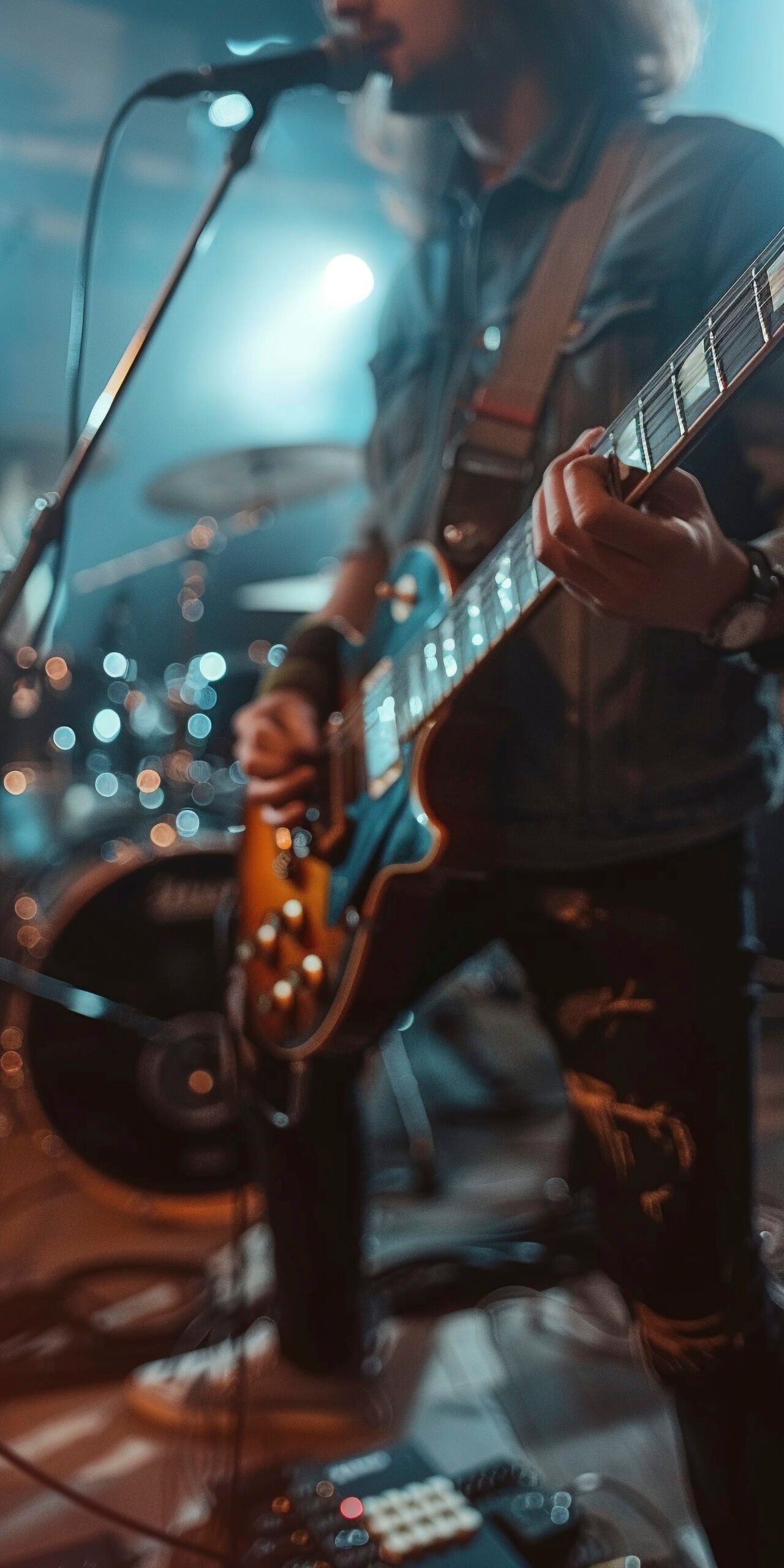 Live music band performing on stage with guitarists, Nashville style