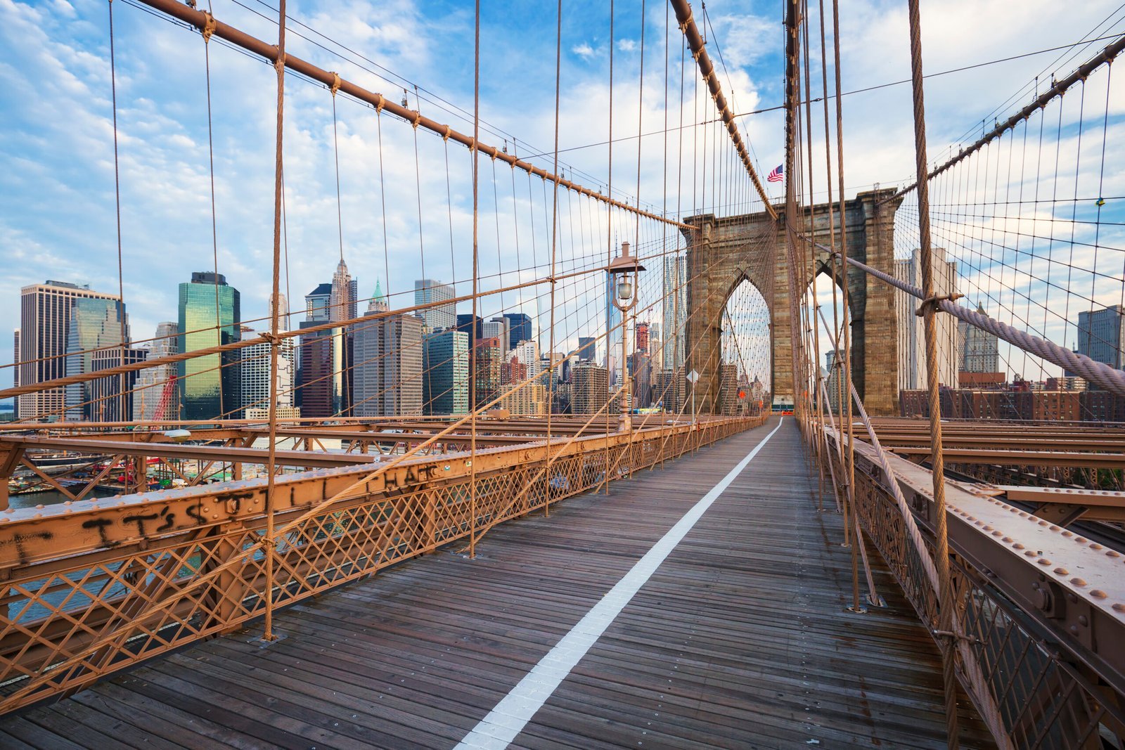 New York City Brooklyn Bridge with Manhattan skyscrapers and city skyline