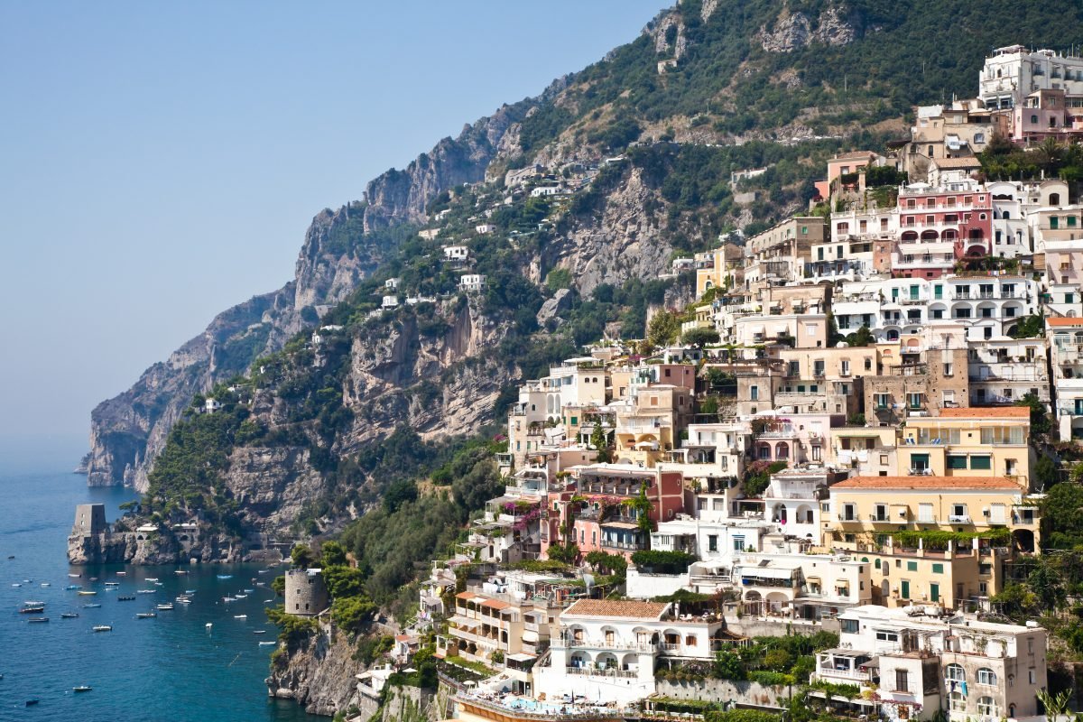 Positano village rising above the beach