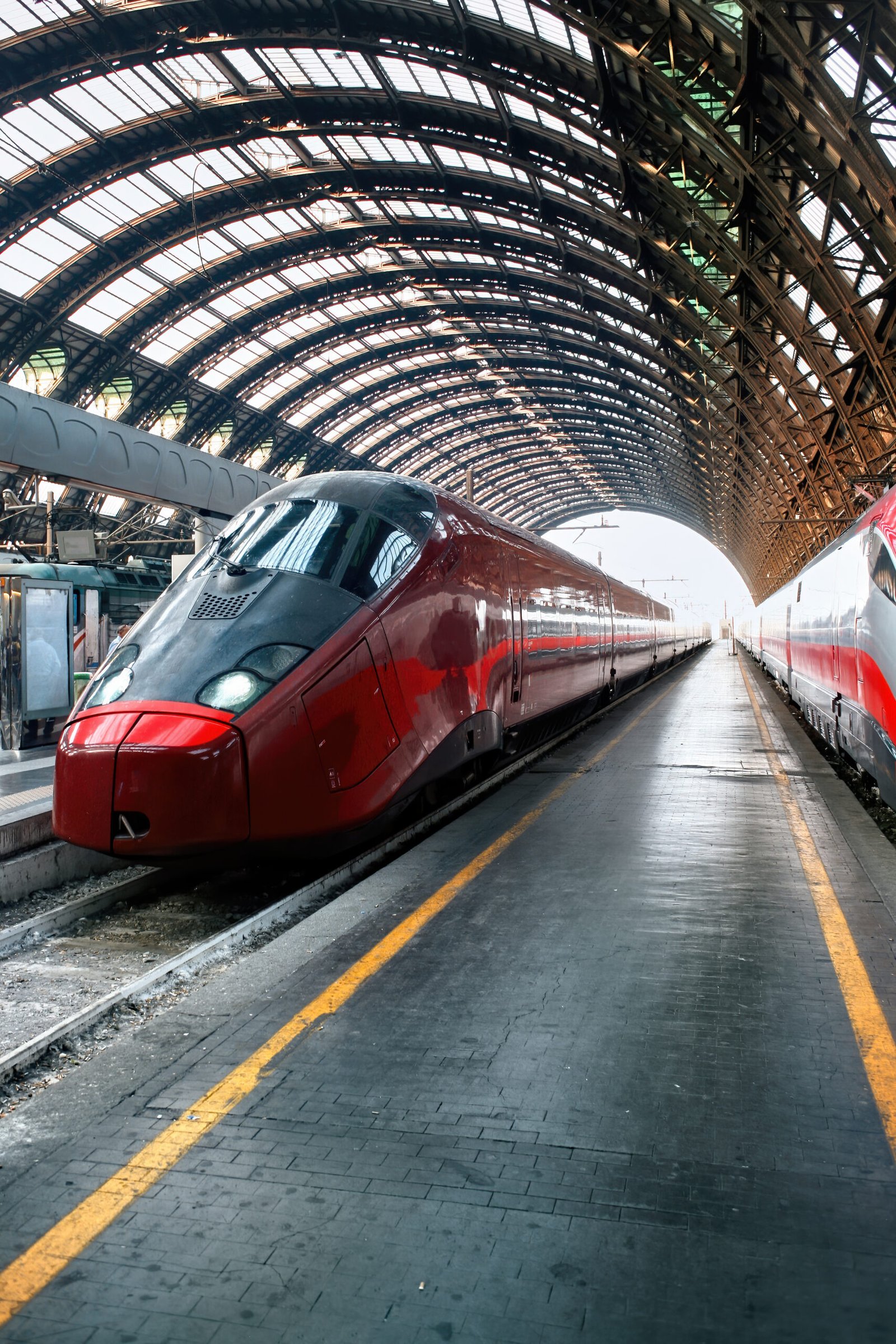 Train at a central station platform in Italy