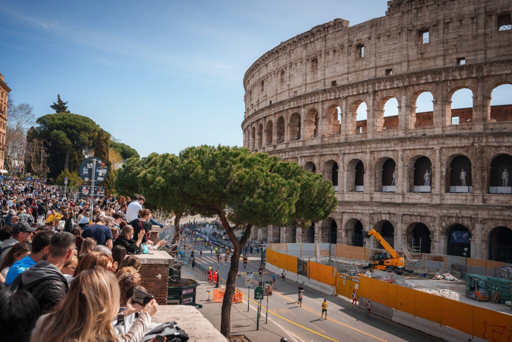 Bustling scene with tourists at the Colosseum in Rome, Italy