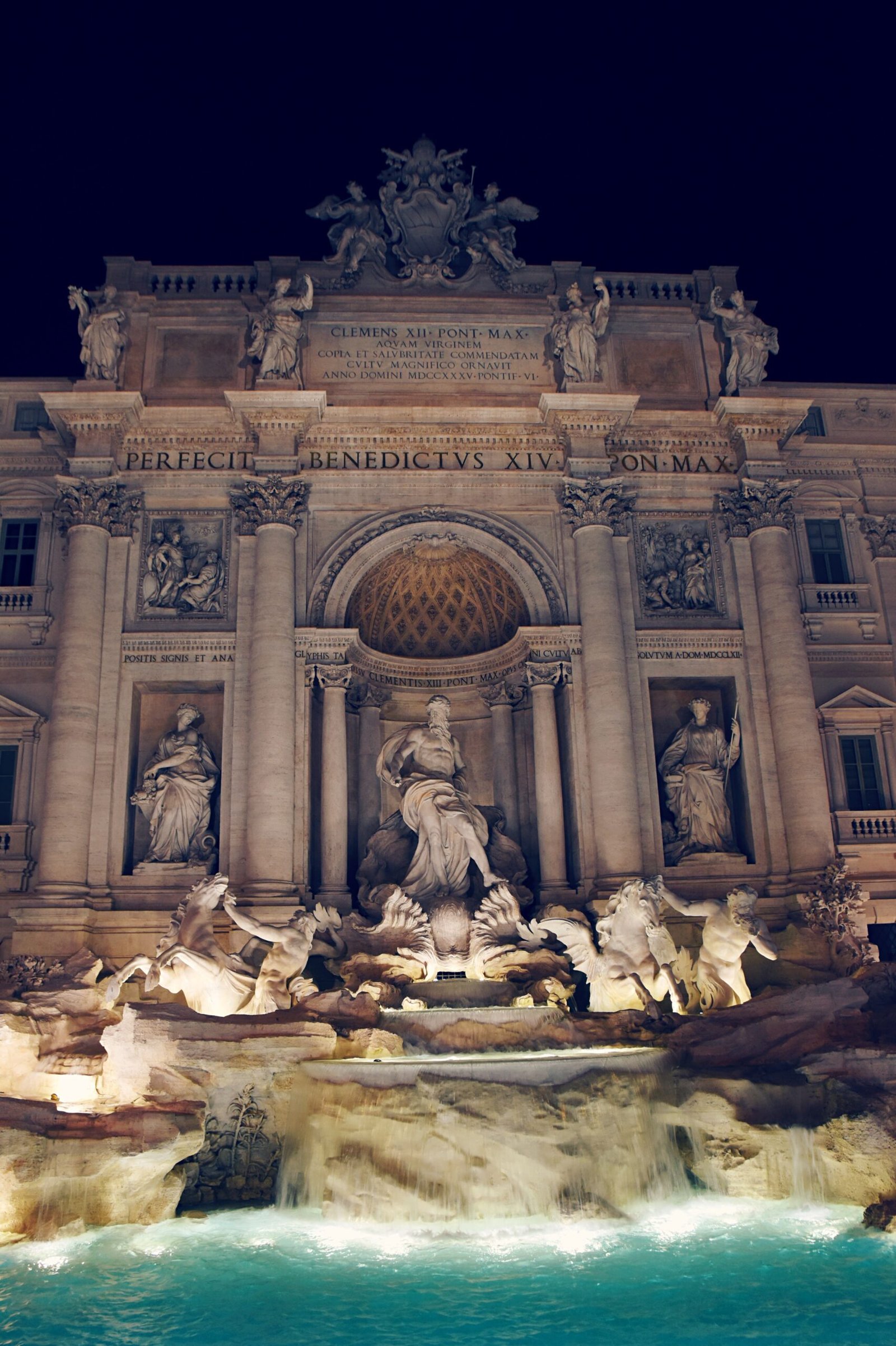 Illuminated Trevi Fountain at night, Rome