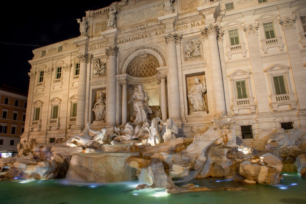 The Trevi Fountain illuminated at night in Rome, Italy