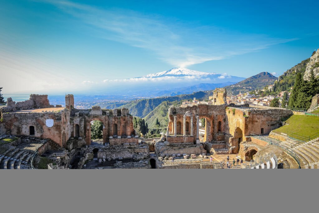 View of Mount Etna from the ancient Greek theater in Taormina, Sicily