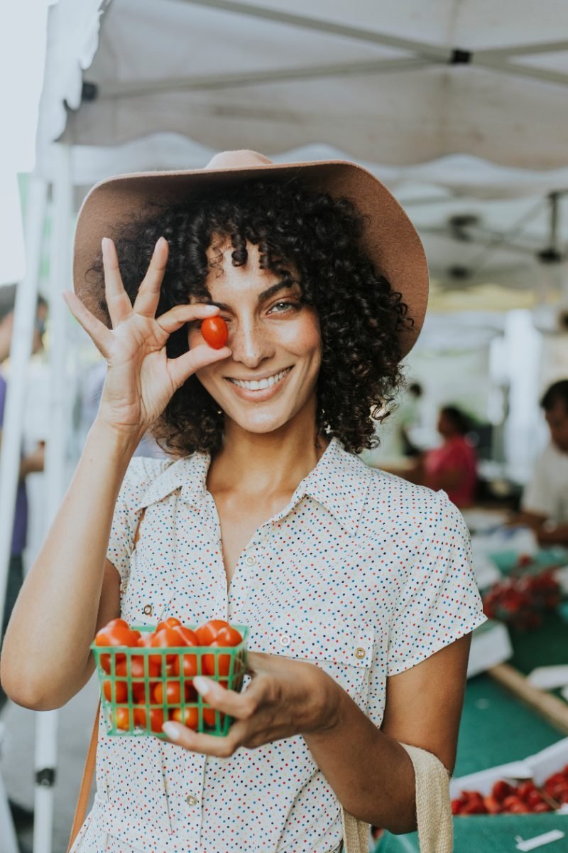 A solo traveler shopping at a local market