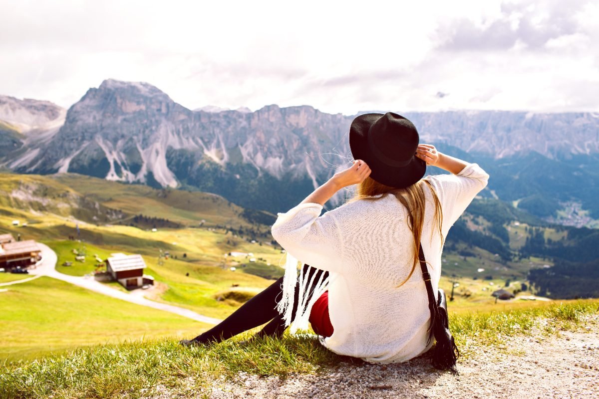 A solo traveler enjoying mountain views in Central Europe