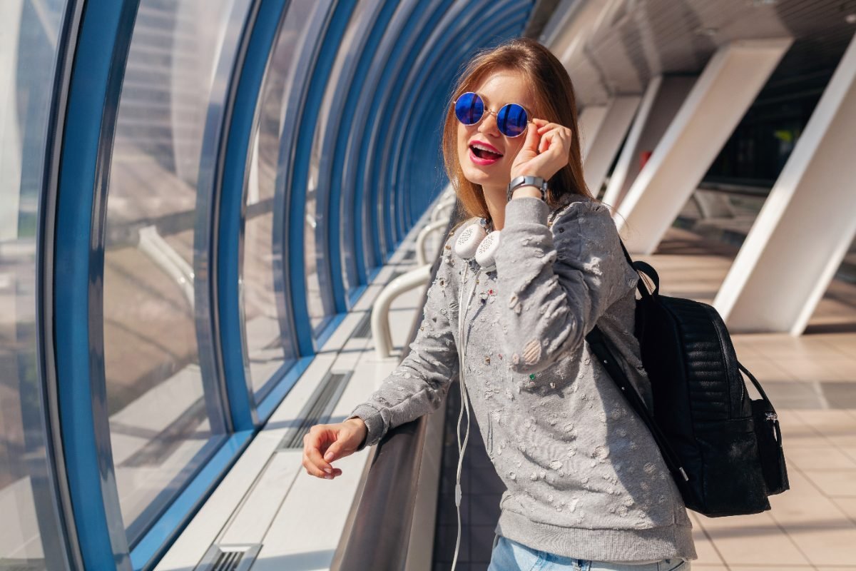A solo traveler with a backpack in a city