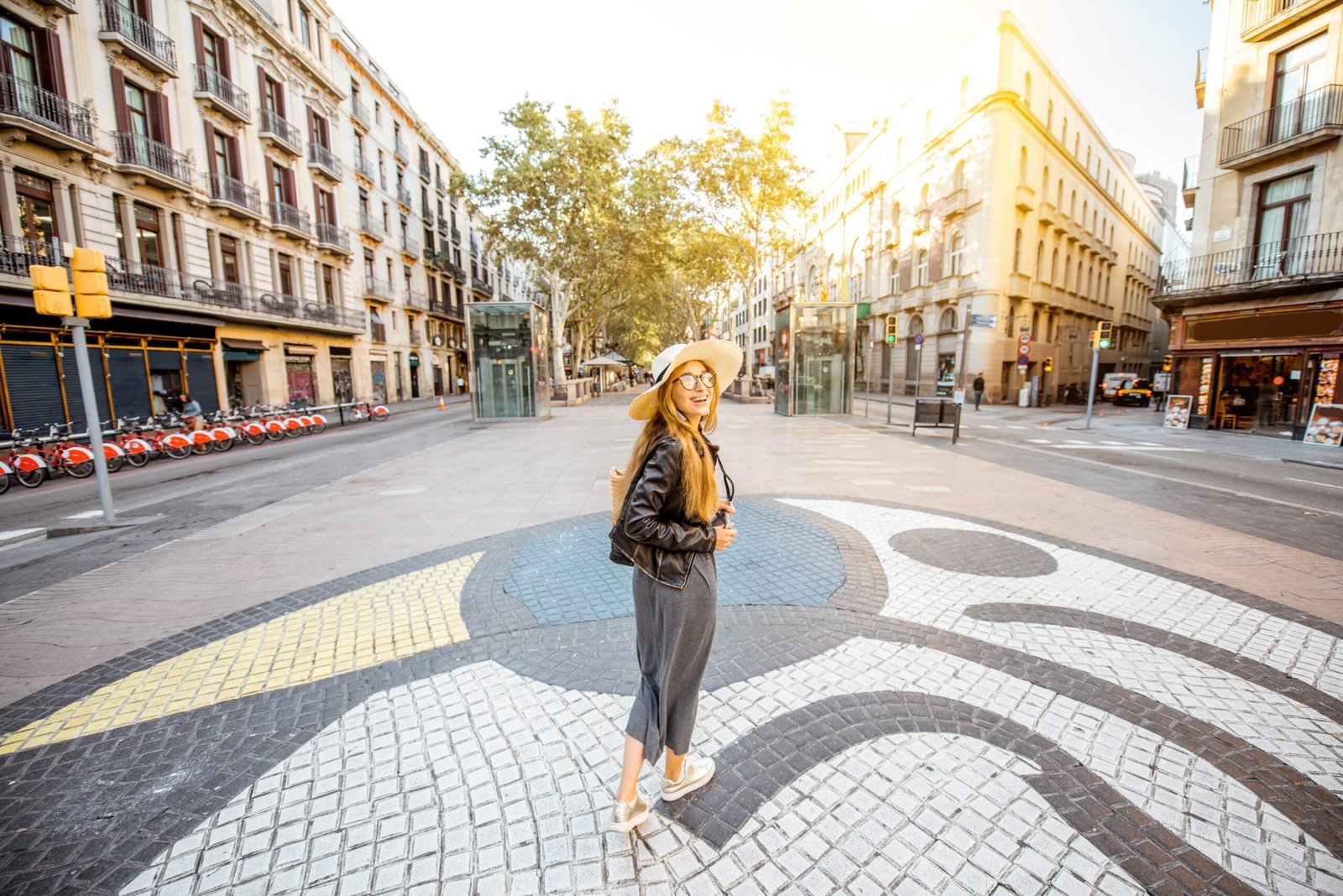Woman walking on a central street in Barcelona, Spain