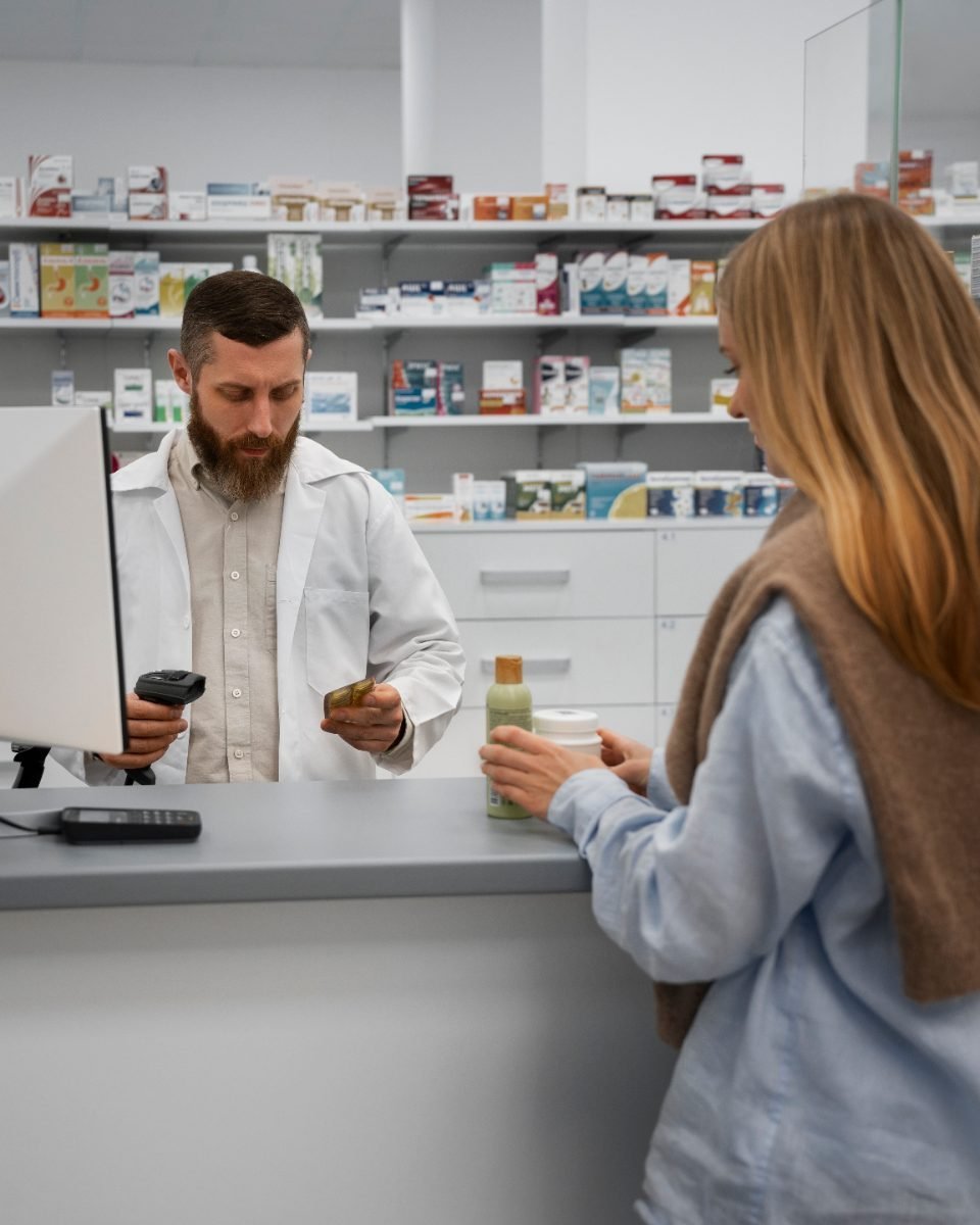 A pharmacist helping a customer