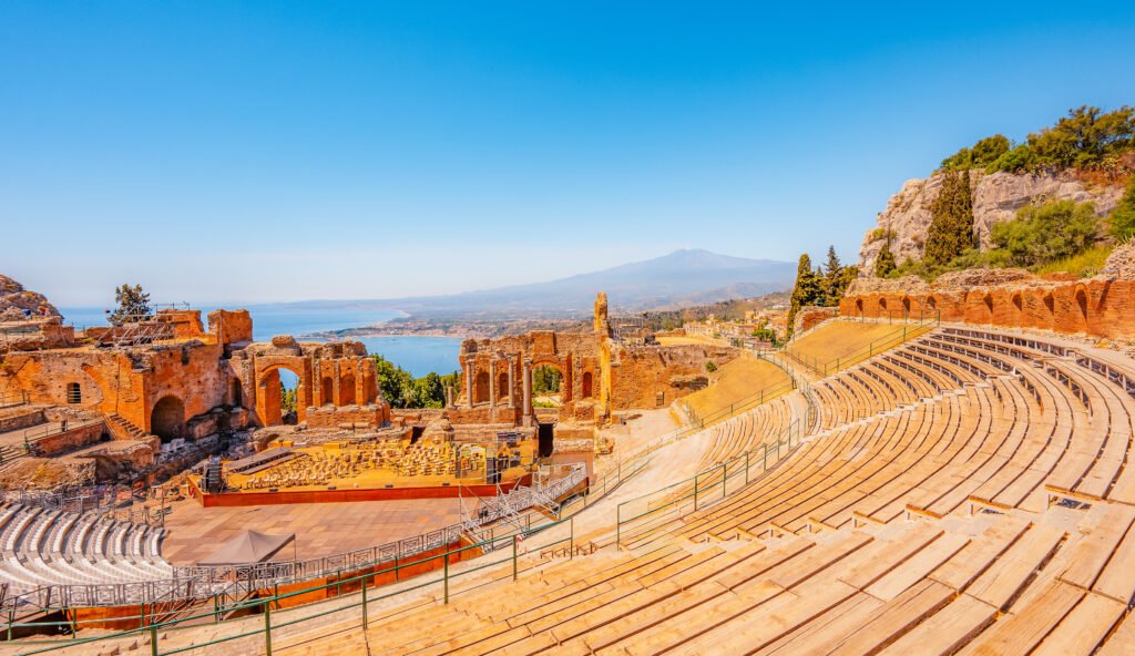 Ancient Greek theater of Taormina with Mount Etna in the background, Sicily