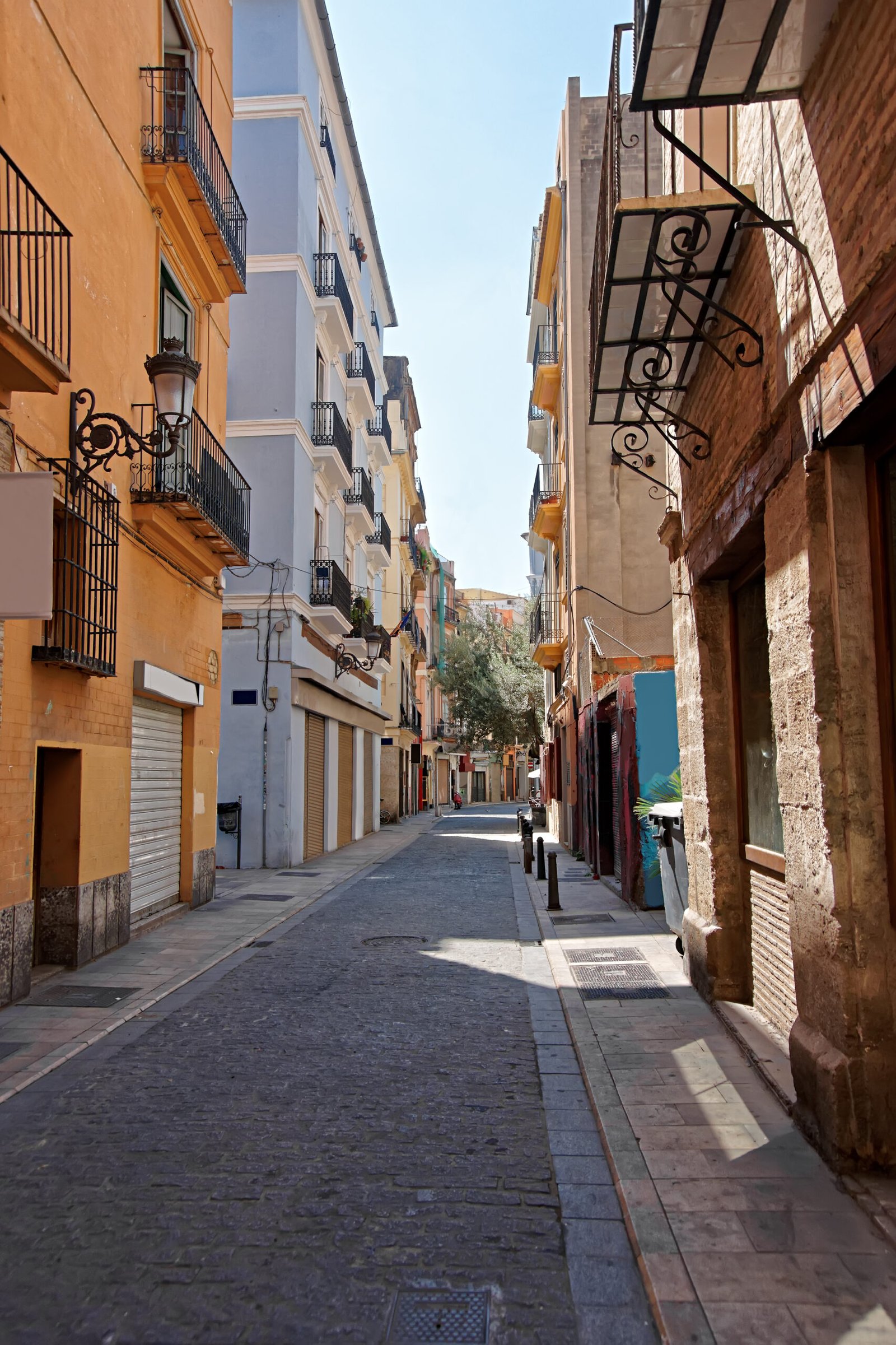 Narrow street in the old city center of Valencia, Spain