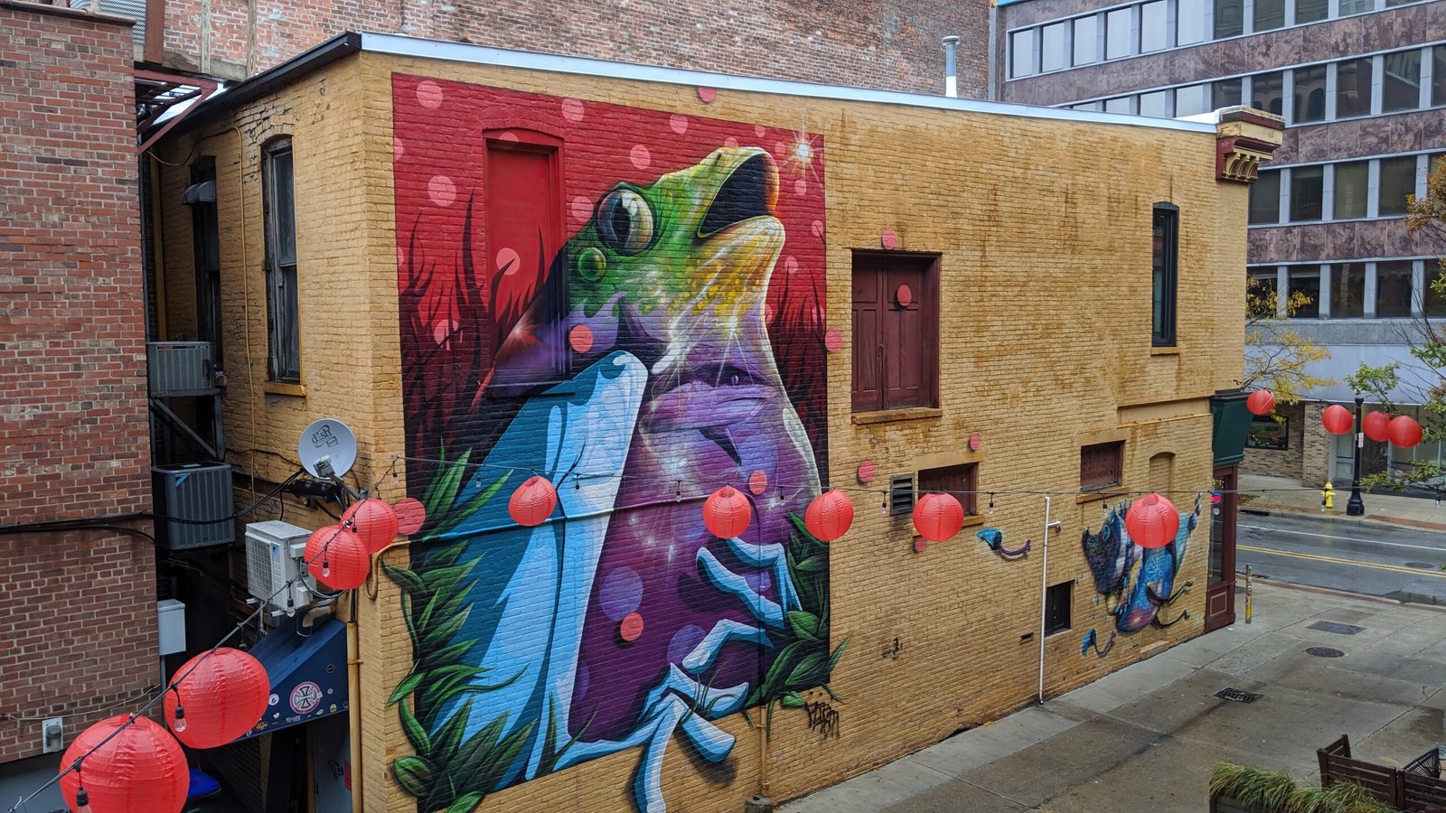 Vibrant colorful street art mural on urban building