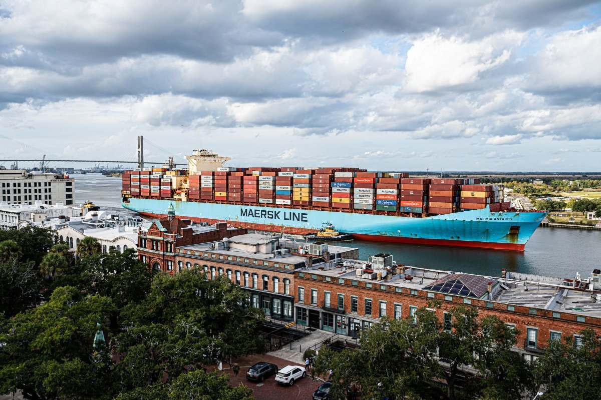 A cargo ship on the Savannah River passing the historic waterfront