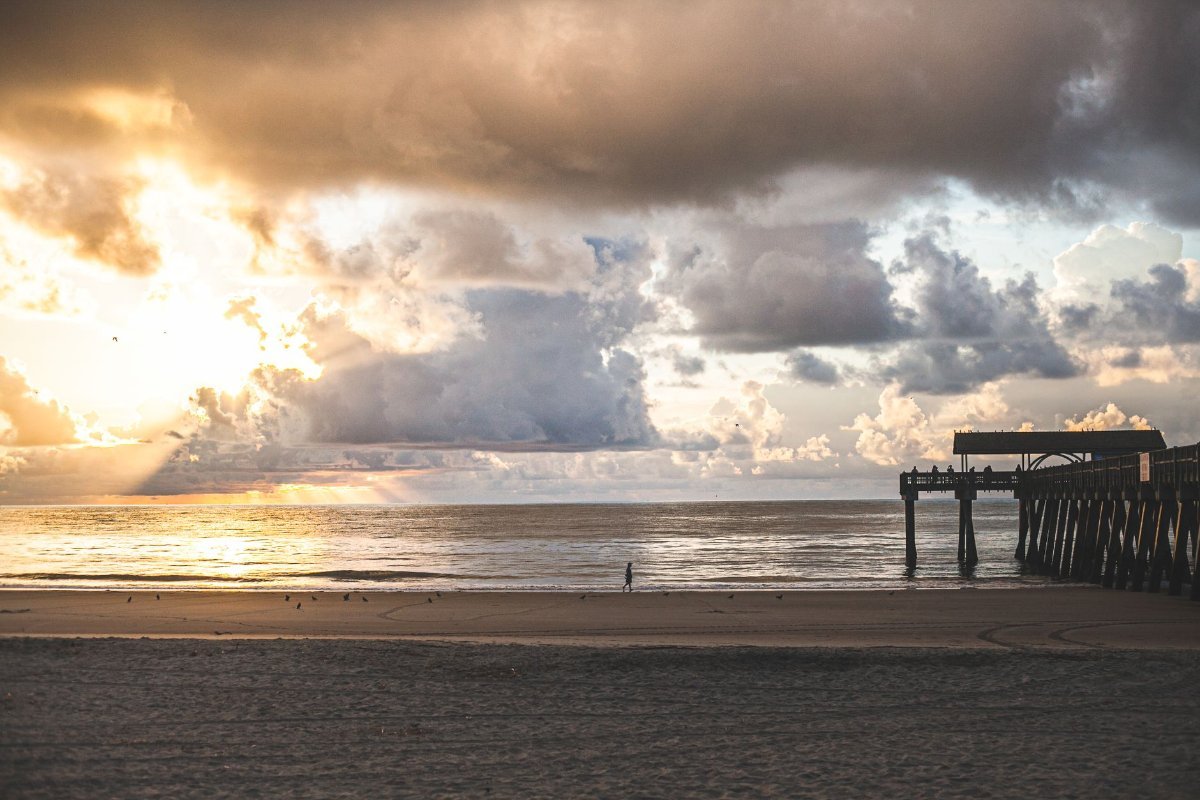 The wide beach and pier at Tybee Island, Savannah's beach