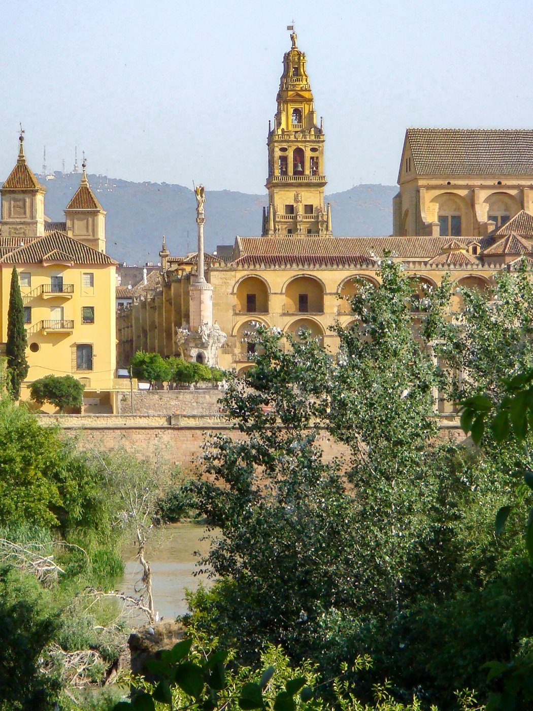 The bell tower of the Mezquita rising over Cordoba, Spain, on a summer day