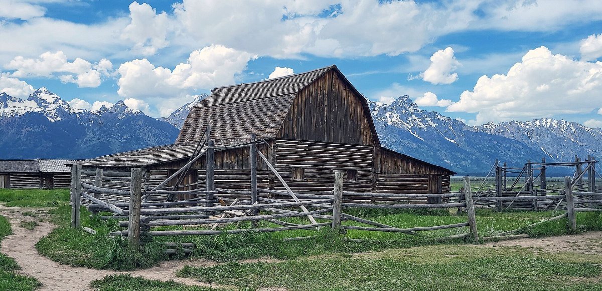 The historic barns of Mormon Row below the Tetons