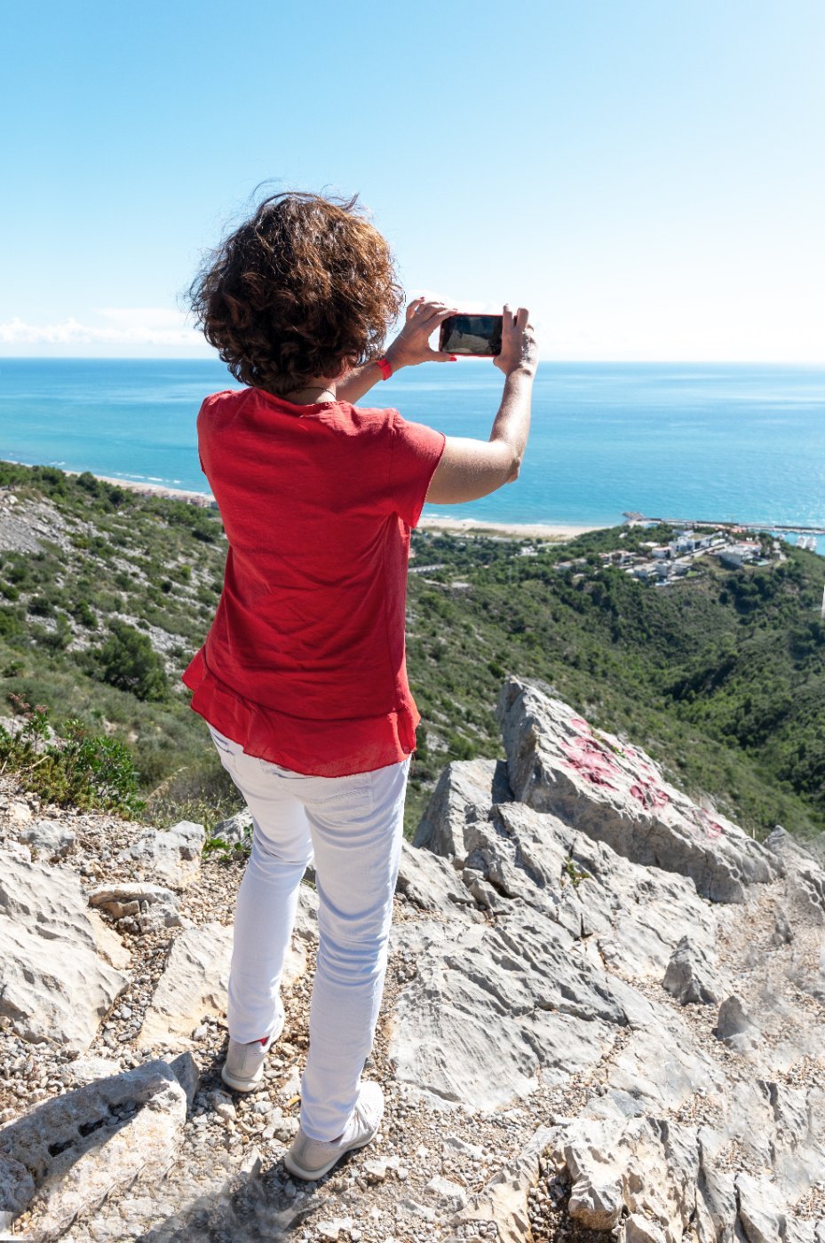 Photographing the sea from the rocks