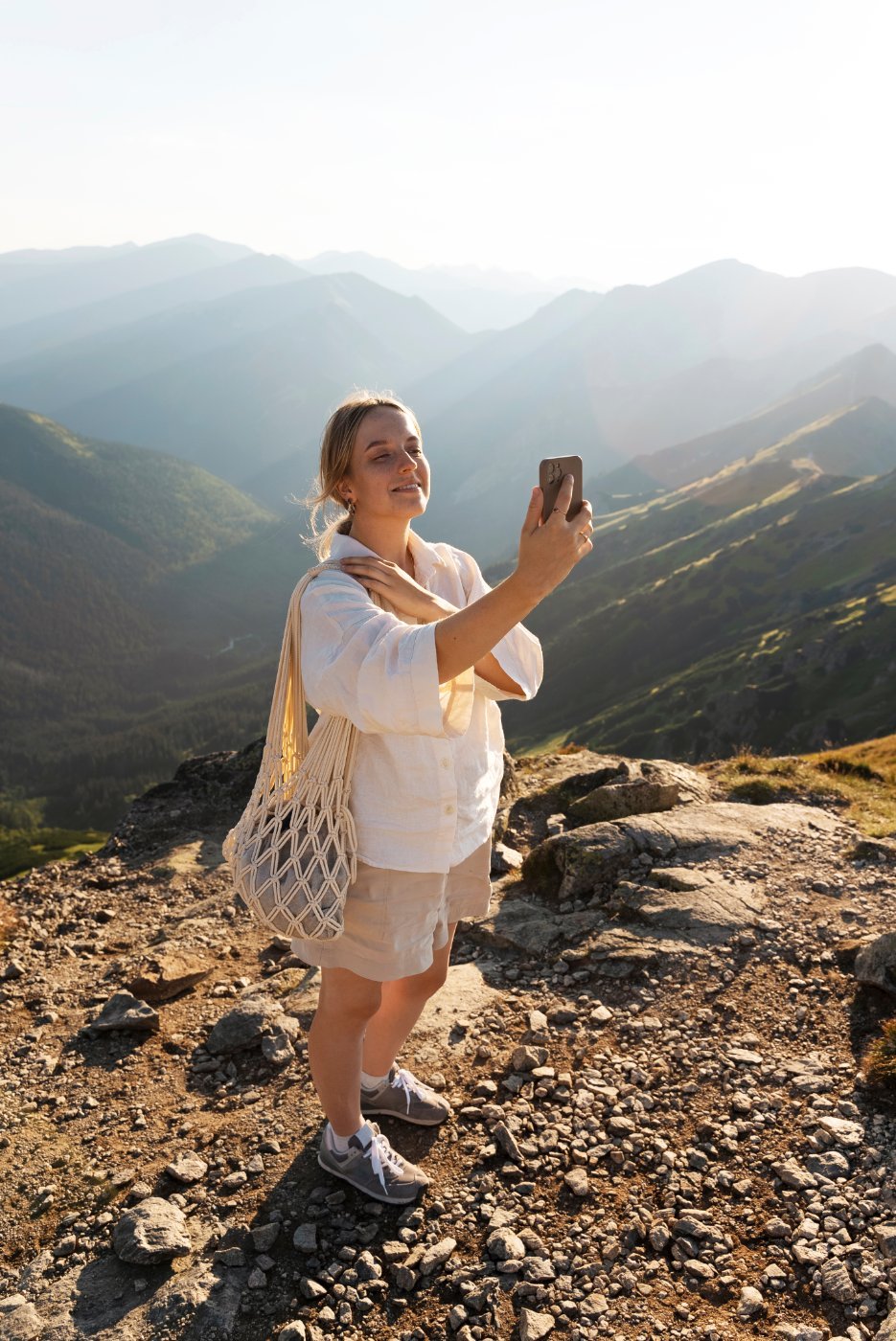 Setting up a shot on a mountainside