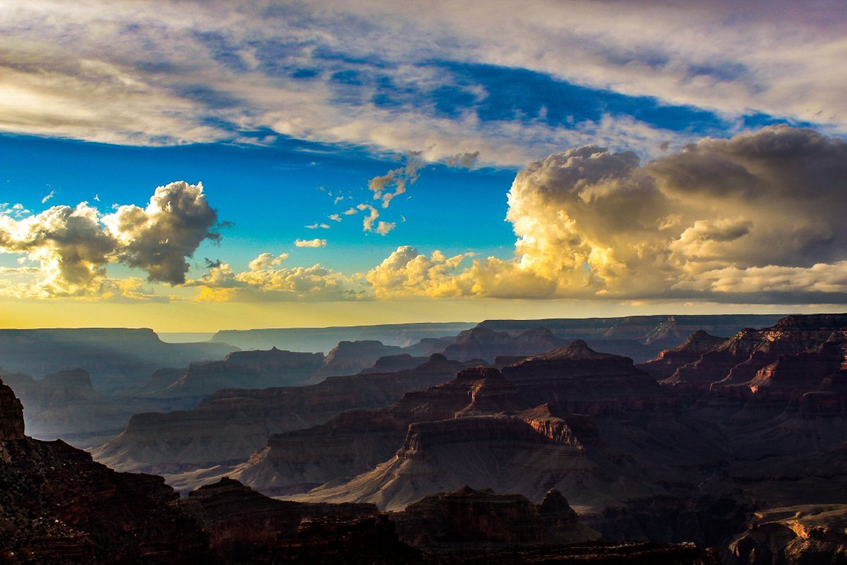 Sunset light moving across the canyon from the South Rim