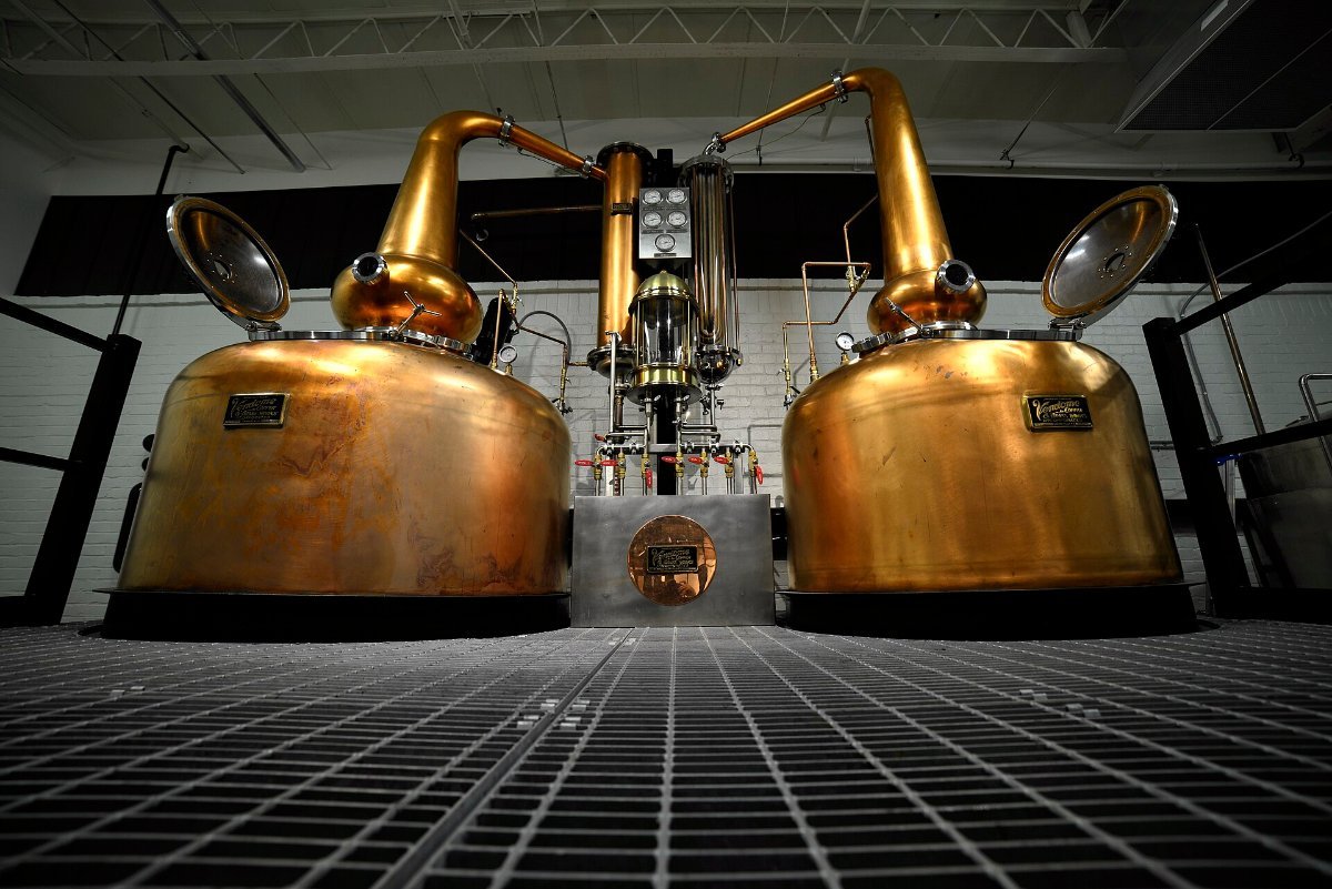 Copper stills in a bourbon distillery