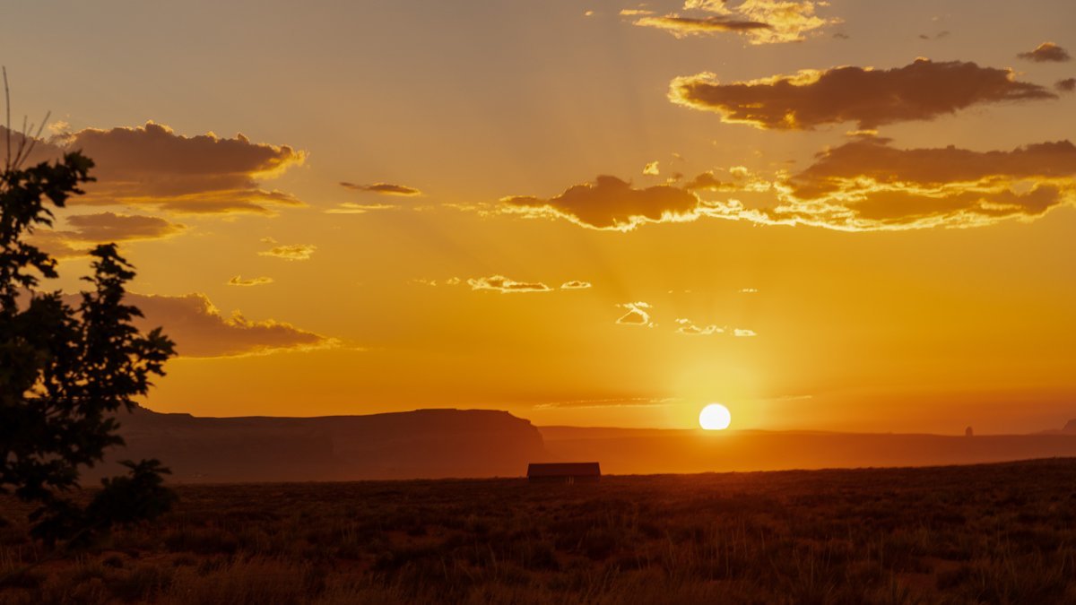 Sunset over the buttes of Monument Valley