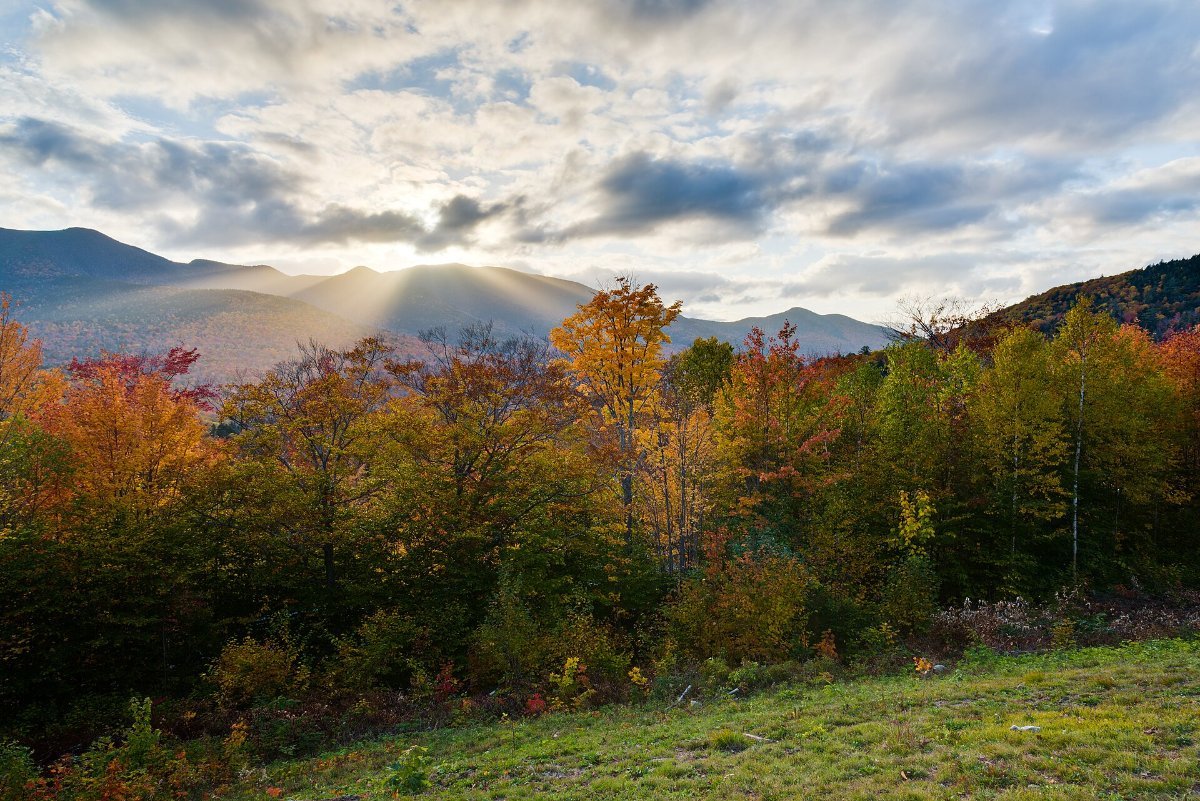 The Kancamagus Highway winding through the White Mountains in autumn