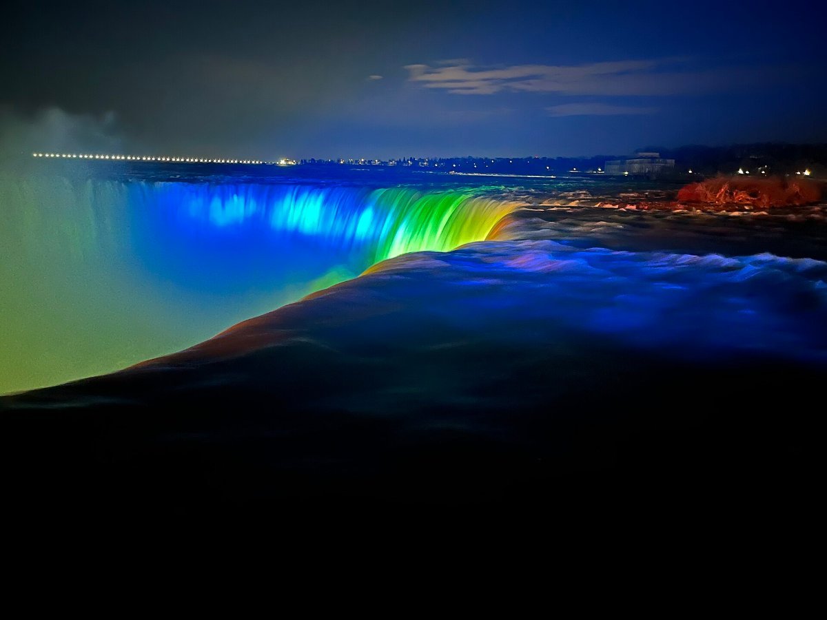 Niagara Falls illuminated at night