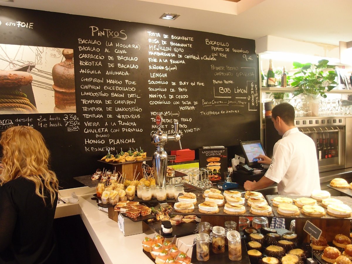 Pintxos lined up on a bar counter in the Basque Country