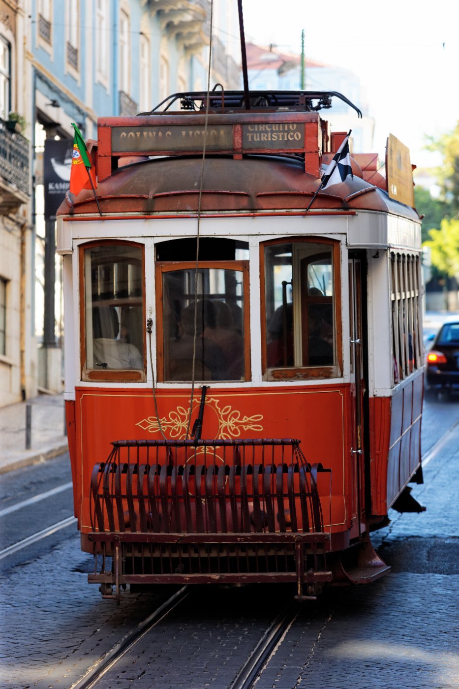 A tram on a narrow street in old Lisbon