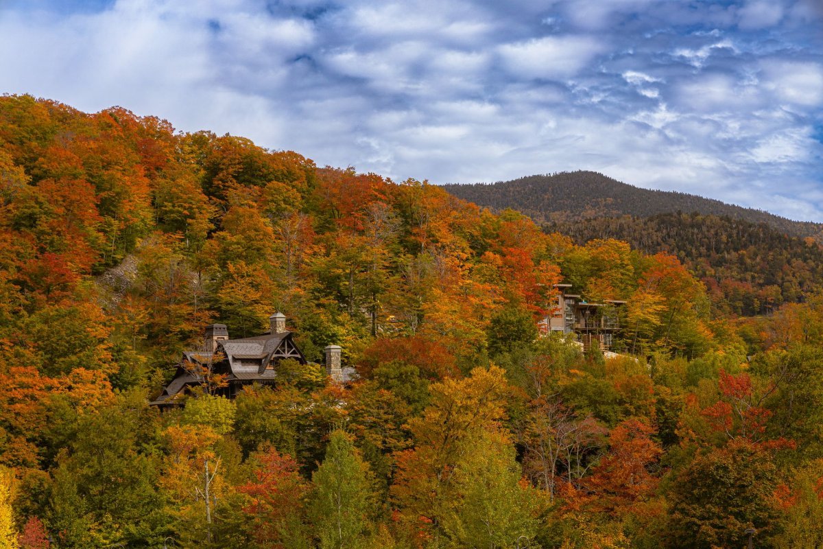 The white steeple of Stowe against autumn hills