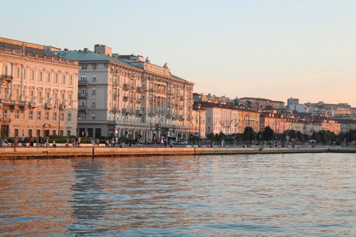 The waterfront buildings of Trieste at sunset