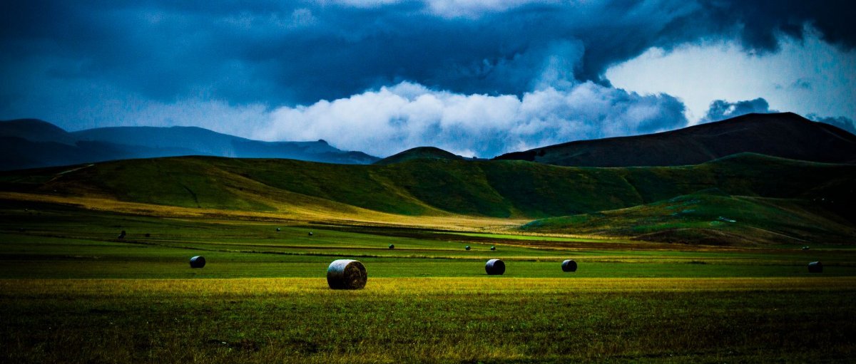 Rolling countryside hills at sunset