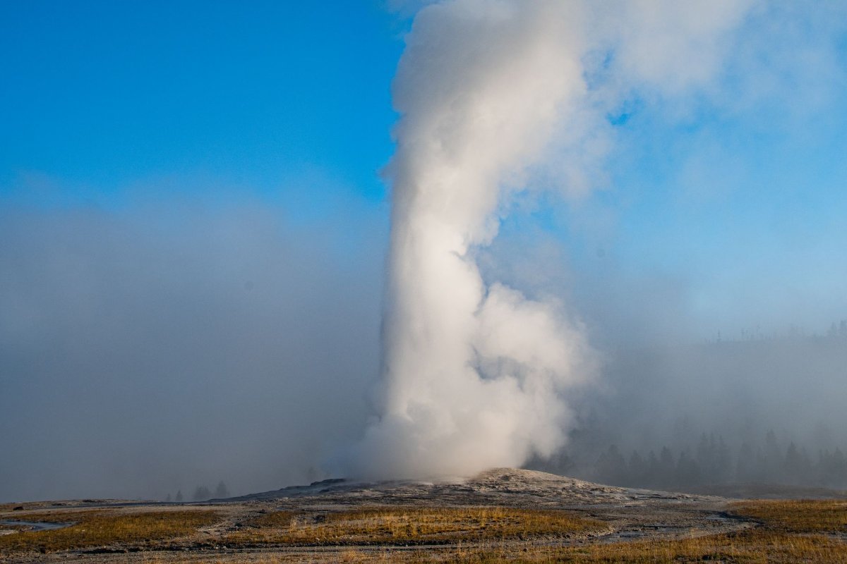 Old Faithful erupting in the Upper Geyser Basin