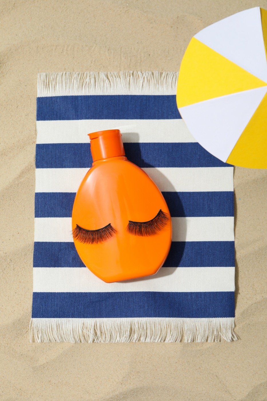 Summer skincare and sun protection laid out from above