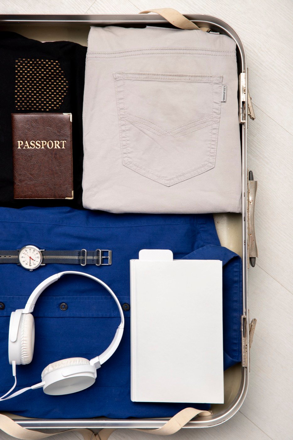 A suitcase packed with travel essentials