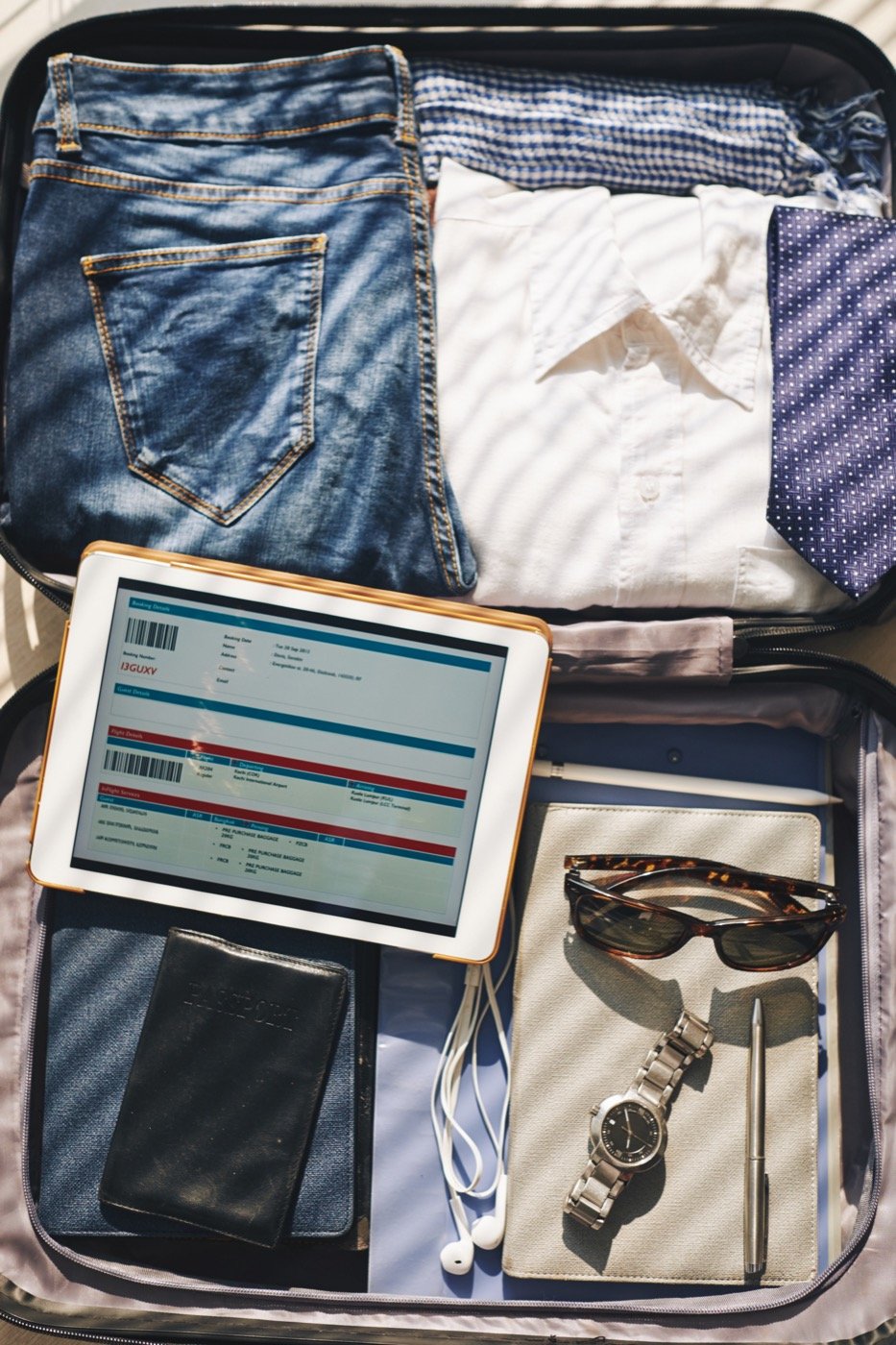 A packed suitcase ready for a short business trip