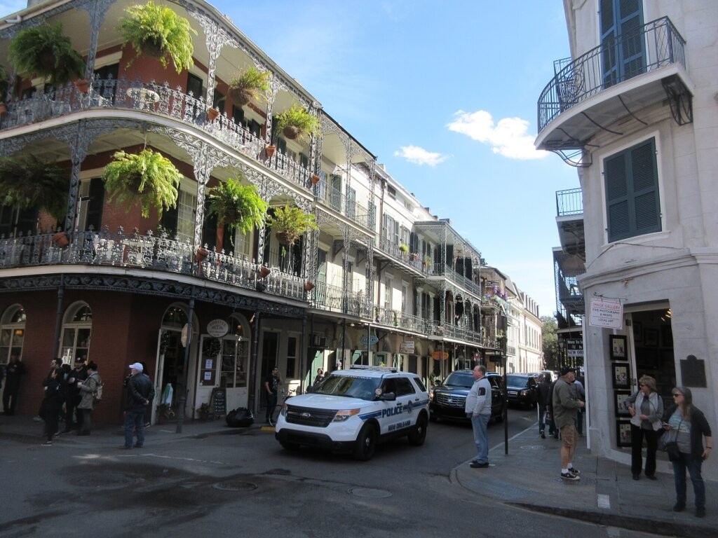 Iron-lace balconies hung with ferns on Royal Street in the French Quarter