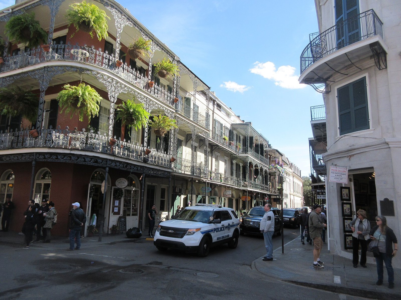 Iron-lace balconies hung with ferns on Royal Street in the French Quarter