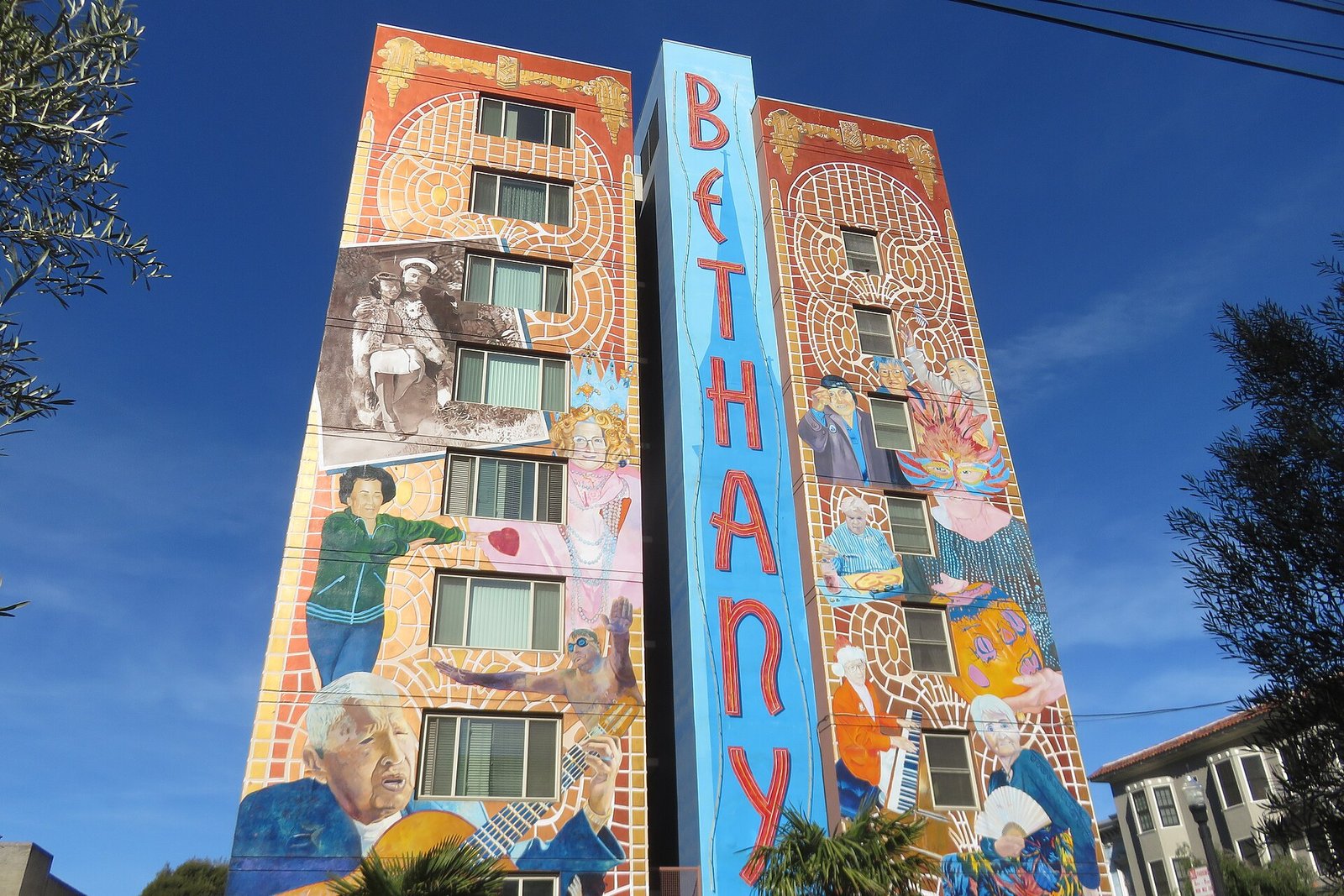 A mural covering an apartment building in the Mission District